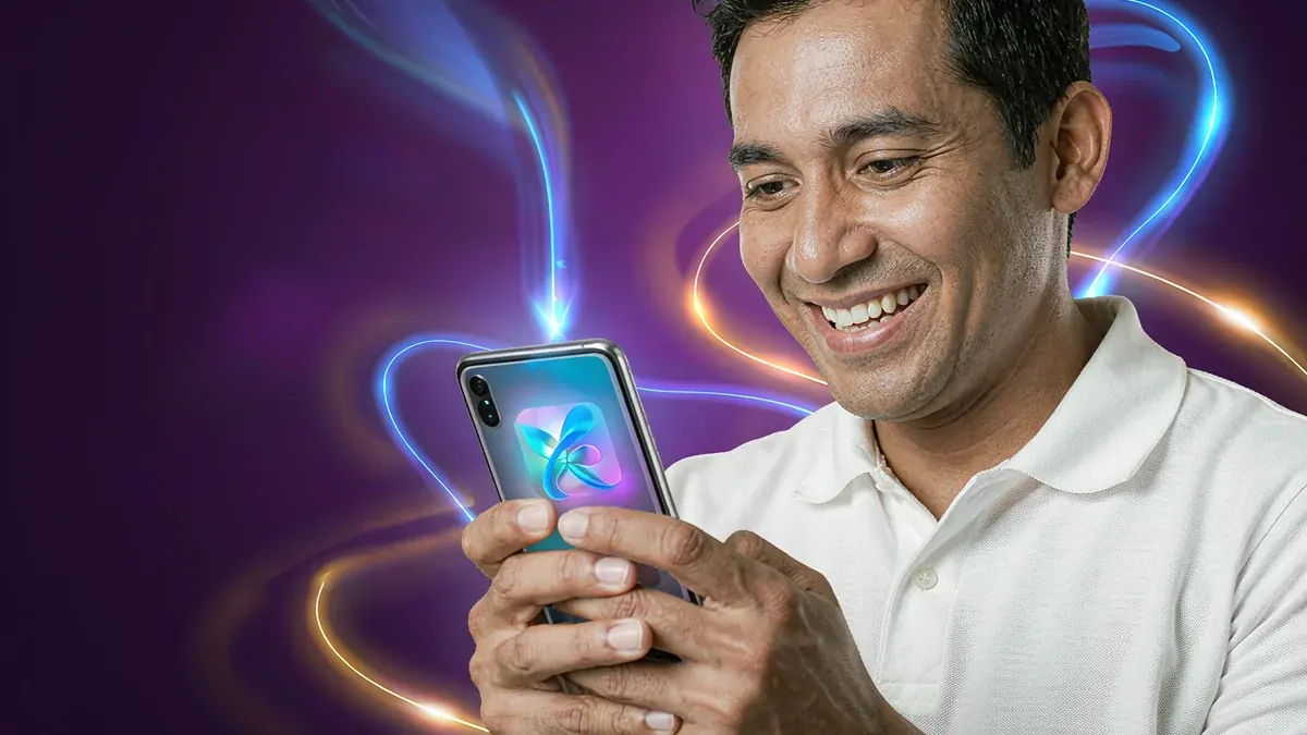 Man holding a smartphone against a neon background — Elon Casino